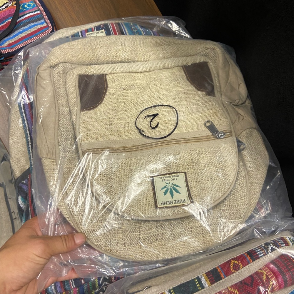 Hemp backpacks, side shoulder bags, and wallets.